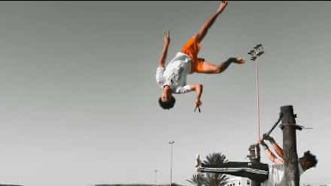 Young athlete performs impressive acrobatic stunt on Moroccan beach