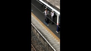 Train rolling into Ranzan station in Japan