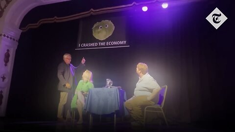 Ex-UK PM Liz Truss storms off stage after lettuce banner stunt