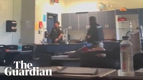 Georgia: footage shows students hiding in classroom as shooter enters campus