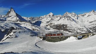 Train through the snowy mountains