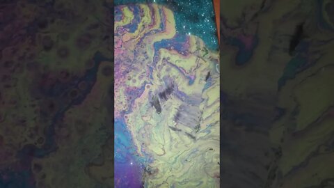 acrylic pour painting with glitter accents