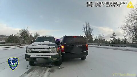 Tigard police officer nearly hit while helping stranded driver