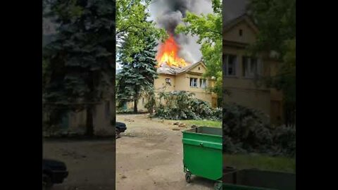 A house burns after one of many strikes on Donetsk city today