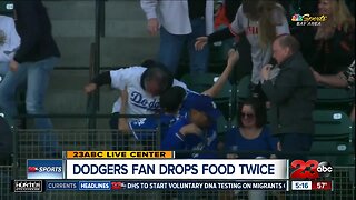 Dodgers fan drops food twice