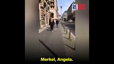 🇩🇪‼️ NEW – Angela 👹 Merkel is confronted on the streets of Berlin while surrounded by guards