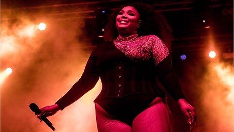 Lizzo Wears $37,000 Cape Backwards