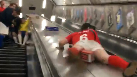 Darts Fan Takes NASTY Shot to the Nuts While Sliding Down an Escalator