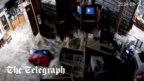 New York: Moment floodwater causes library walls to cave in