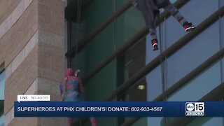 Superheroes lift spirits at Phoenix Children's Hospital