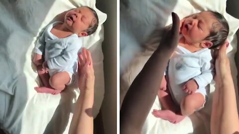 Four-day-old baby's precious moment will steal your heart