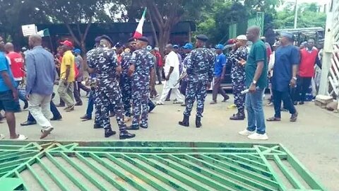 BREAKING: massive Tension Erupts as Protesters Pull Down National Assembly Gate & occupy the venue