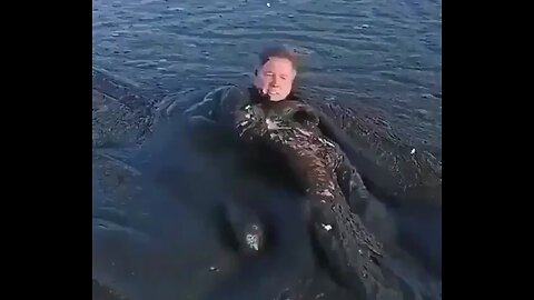 Wildlife photographer crawls through mud to rescue trapped eagle. 😳 Faith in Humanity Restored!!