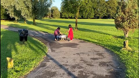 Kids driving car in park