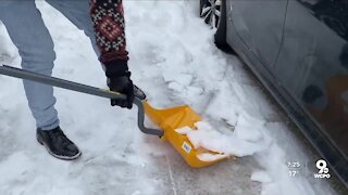 Northside Snow Angels clear winter ice from neighbors' cars