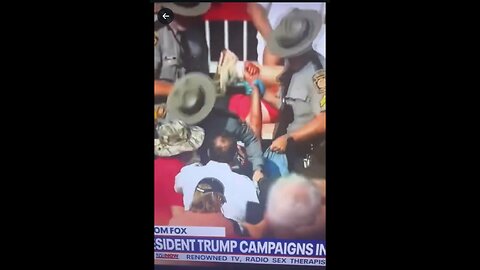 victim taken away from Pres Trump butler pennsylvania rally assassination attempt 7-13-24