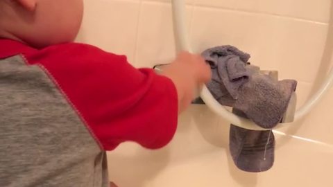 Tot Kid Tries To Fix The Shower