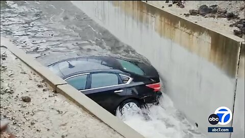 Crash leaves man's car submerged in water in OC