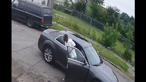 Police seek gunman who injured a father and his 11-year-old son in Detroit