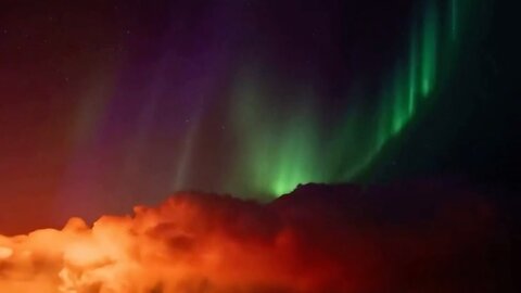 Video shows northern lights shining over erupting Iceland volcano