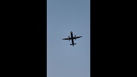 Turboprop propeller plane low flying