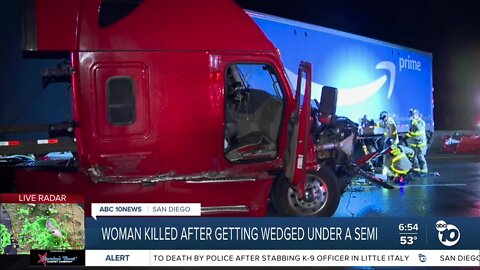 Car collides with jack-knifed big rig, driver dies