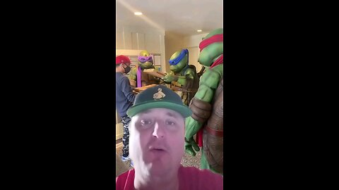 Pizza dude delivers to the ninja turtles.