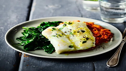 Herb & garlic baked cod with romesco sauce & spinach