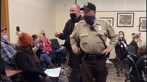 Cops Intimidating Parents at a School Board Meeting