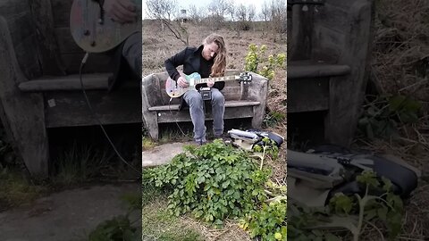 Playing Guitar Outdoors.