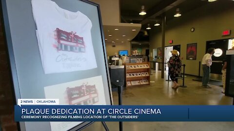 Librarian recognized at The Outsider's plaque dedication at Circle Cinema