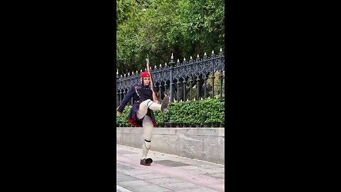 A Greek Evzone (Presidential Guard) Soldiers take part in ceremonial duties, standing guard