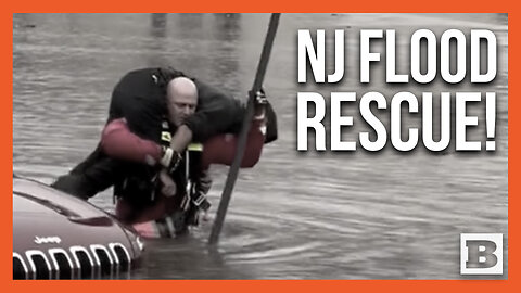 NJ Police Officer RESCUES Driver Stranded in Parking Lot from MASSIVE Flooding