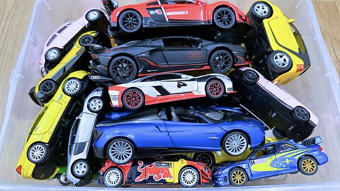 Box full of diecast Cars shown