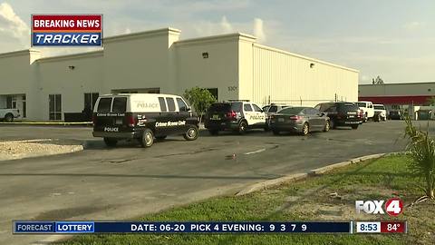 Crime scene investigation in front of Fort Myers business