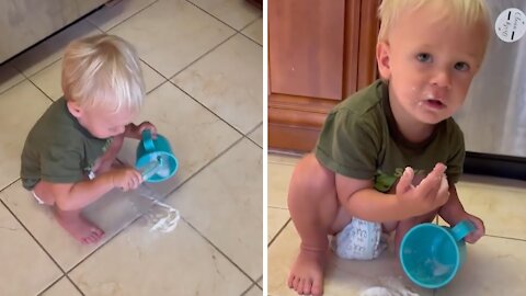 Mom finds quiet toddler eating sugar on kitchen floor #