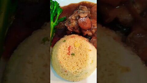 Brown Stew Chicken with couscous Jamaican Style 😋