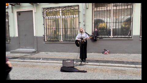 Beautiful Russian girl Street artist in Moscow, Russia, red square