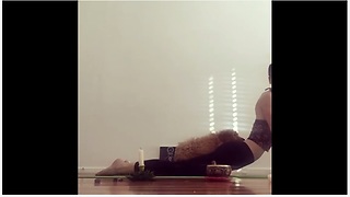 Puppy decides to nap on owner during yoga instruction