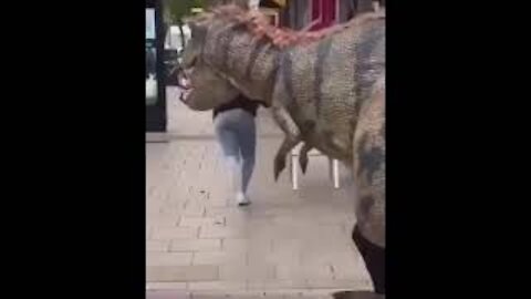 Crazy and funny dinosaur prank in the middle of the town