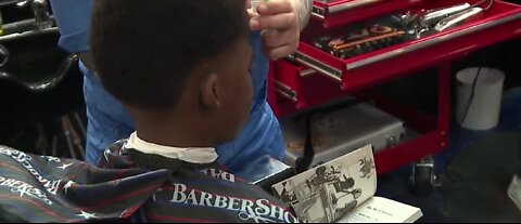 Local Barbershop encouraging kids to read