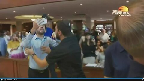 Protester interrupts Gov. Ron DeSantis news conference in Surfside