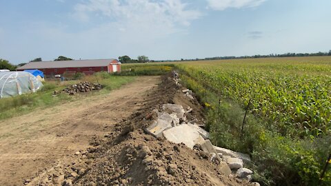 Pond excavation and shooting burm build