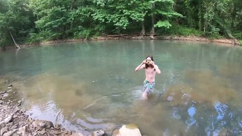 Swimming in the Ozarks. Work continues at the White Oak Adventure Lodge