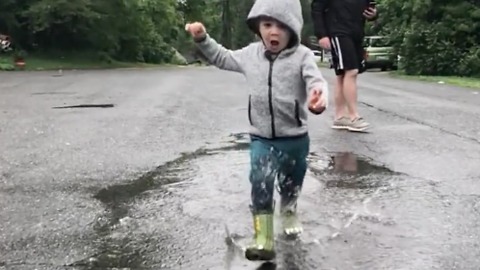 Awesome slow motion toddler puddle jumping