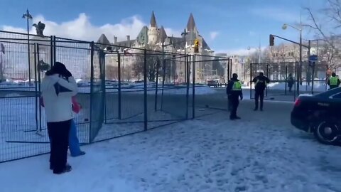 A metal fence is erected around the Parliament building in Ottawa, Canada