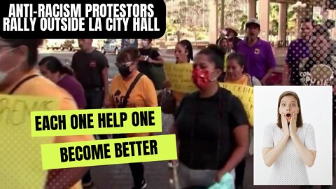 Anti-racism protestors rally outside LA City Hall