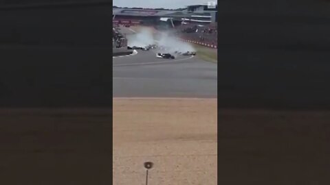 Alfa Romeo driver flips, crashes into fence at British grand Prix