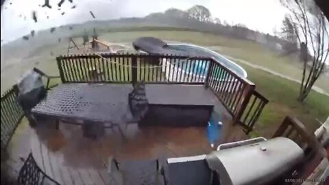 Ring camera shows tornado rip through backyard