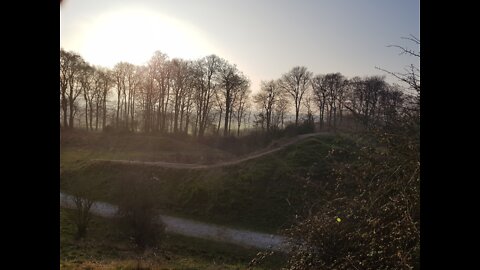 Pretend drone shot using a selfie stick . Danebury hill. Iron age fort.